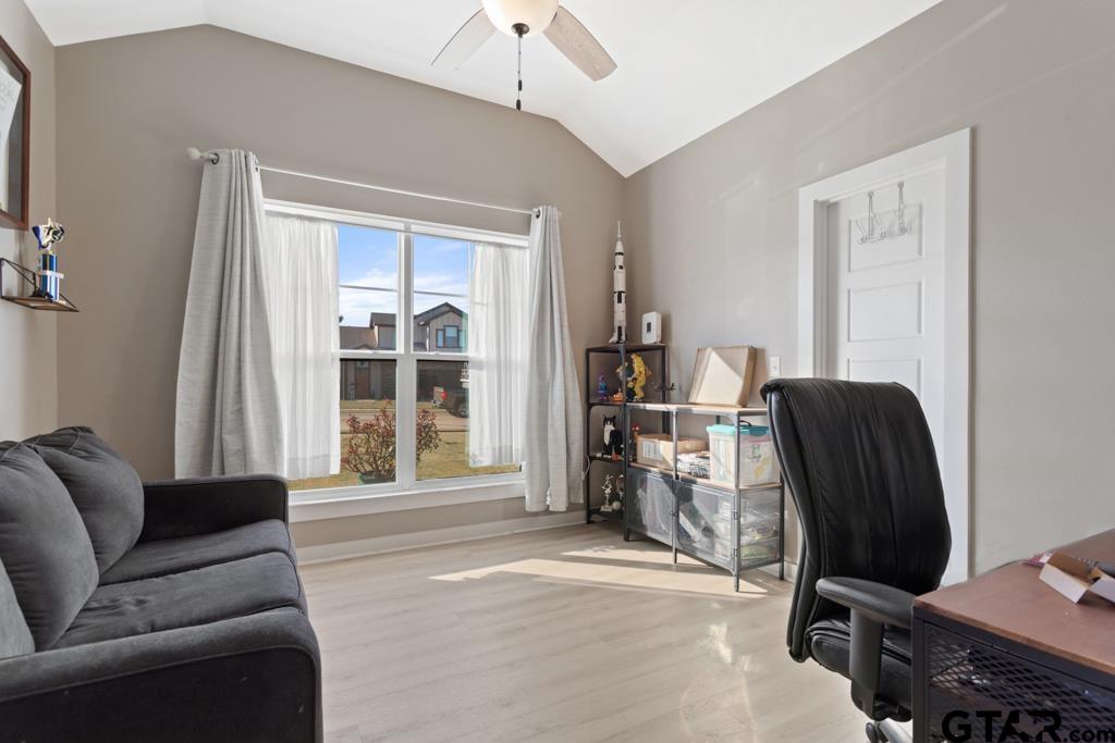 15422 Anna Lane Lindale, TX 75771 - Photo 21 of 28 a living room with furniture and a window