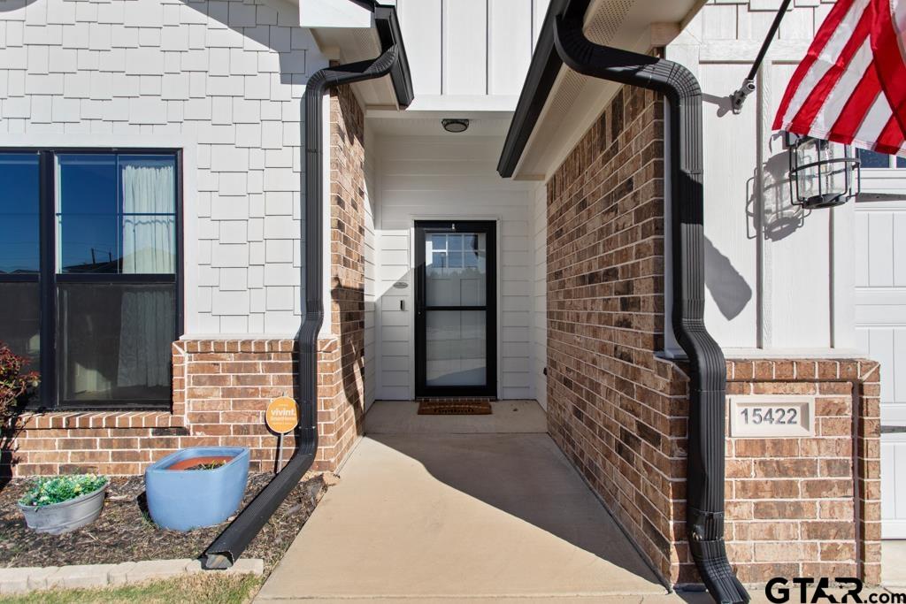 15422 Anna Lane Lindale, TX 75771 - Photo 3 of 28 a front view of a house with outdoor seating