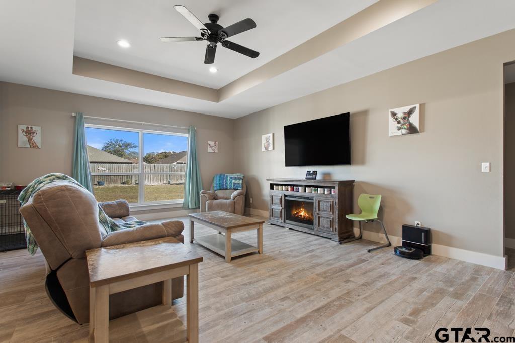 15422 Anna Lane Lindale, TX 75771 - Photo 4 of 28 a living room with furniture and a flat screen tv