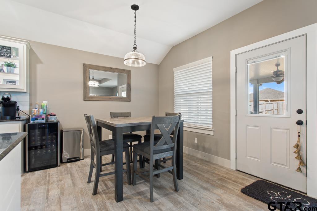 15422 Anna Lane Lindale, TX 75771 - Photo 8 of 28 a view of a dining room with furniture and wooden floor