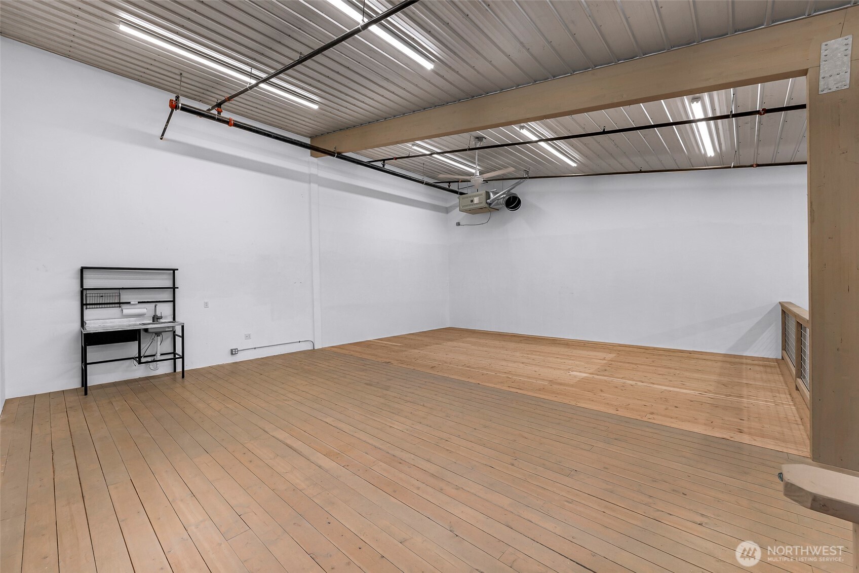 1957 Baltic Way, Unit 110 Ferndale, WA 98248 - Photo 19 of 26 a view of a room with wooden floor
