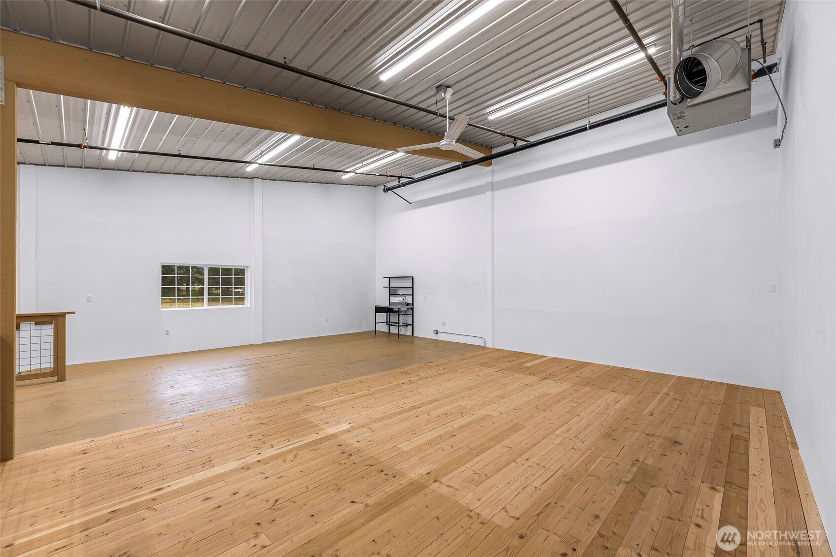 1957 Baltic Way, Unit 110 Ferndale, WA 98248 - Photo 21 of 26 a view of empty room with wooden floor