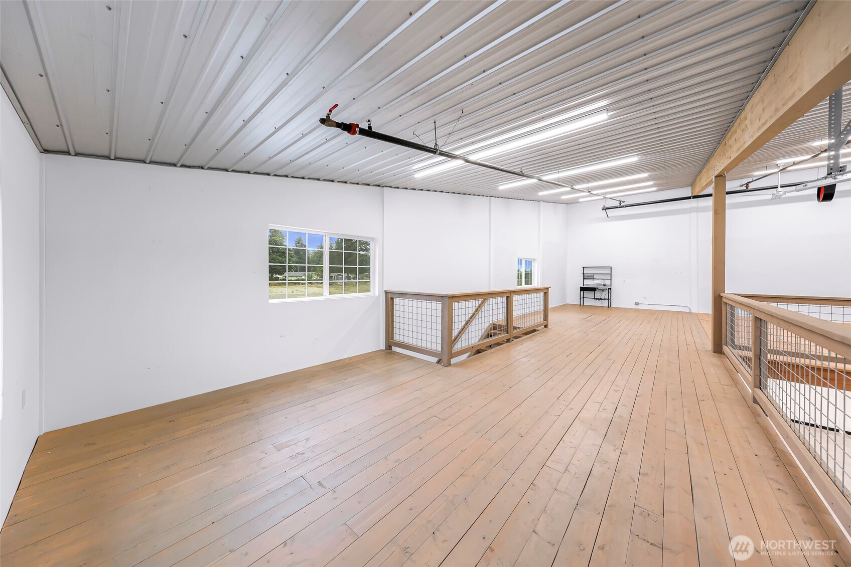1957 Baltic Way, Unit 110 Ferndale, WA 98248 - Photo 25 of 26 a view of a room with wooden floor