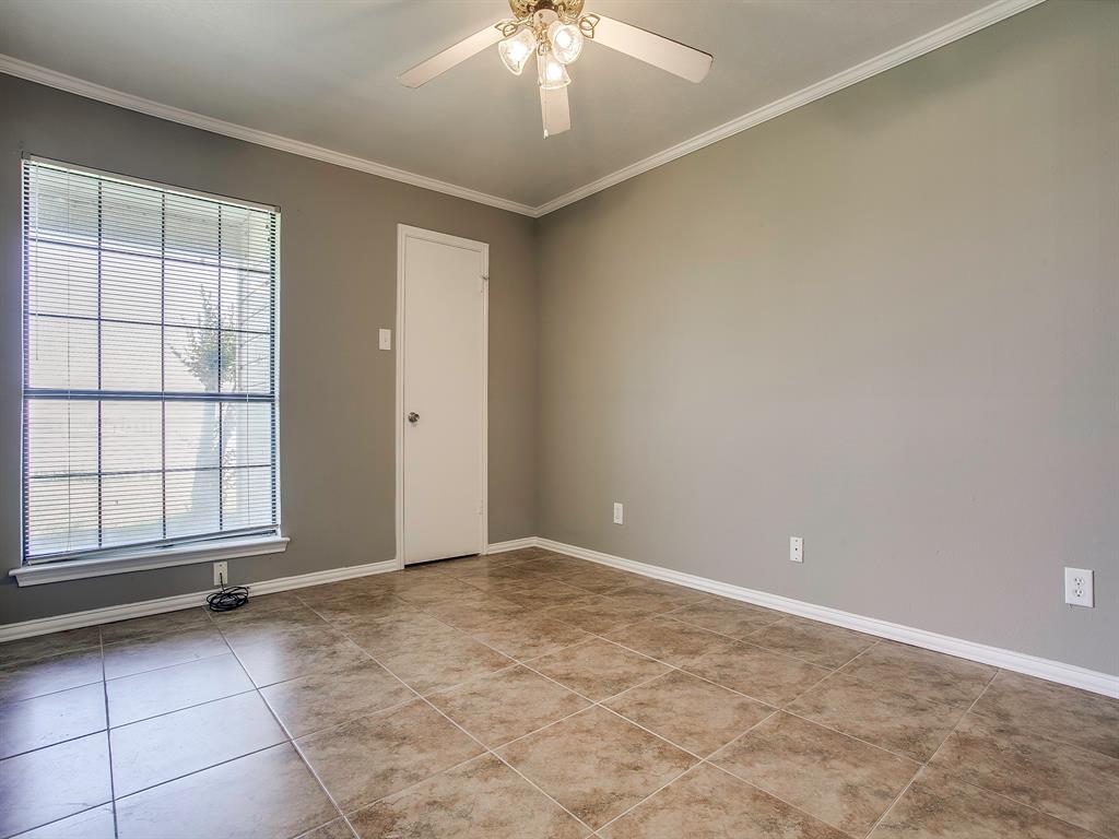 4492 Chaha Road, Unit 102 Garland, TX 75043 - Photo 13 of 40 an empty room with windows and closet