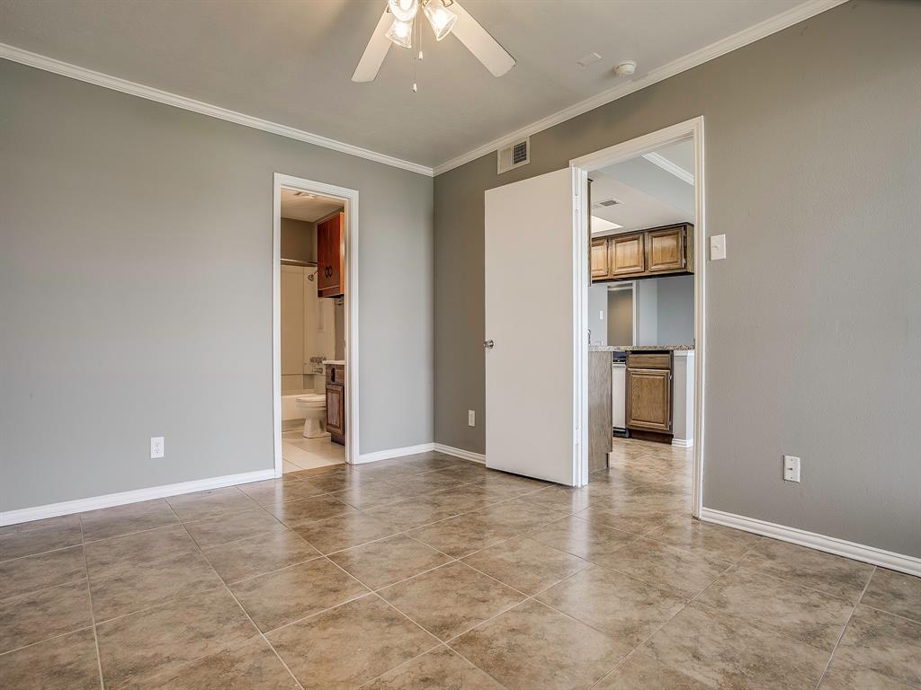 4492 Chaha Road, Unit 102 Garland, TX 75043 - Photo 14 of 40 an empty room with closet and windows