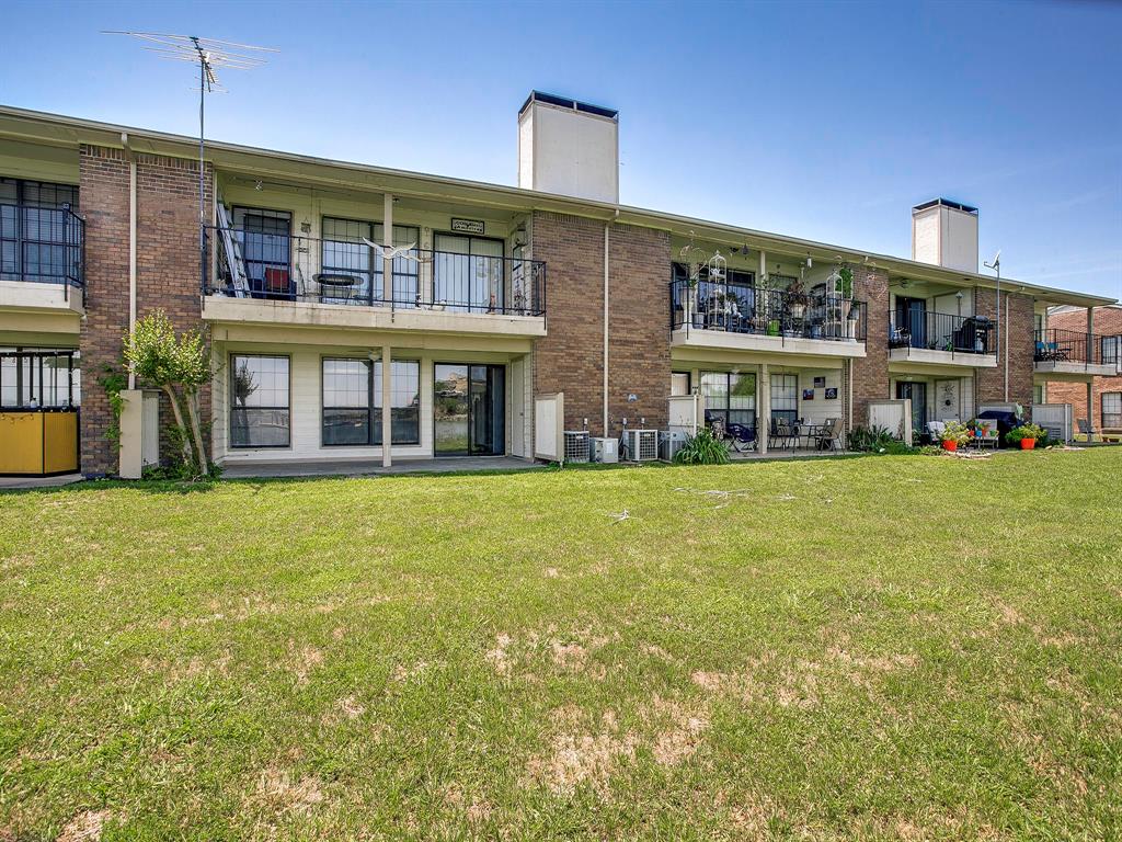 4492 Chaha Road, Unit 102 Garland, TX 75043 - Photo 21 of 40 a front view of building with yard