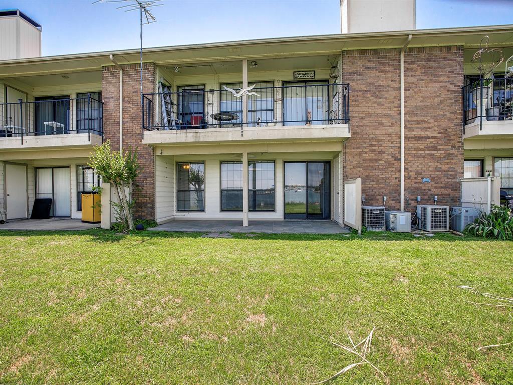 4492 Chaha Road, Unit 102 Garland, TX 75043 - Photo 22 of 40 a view of a brick house with a large windows