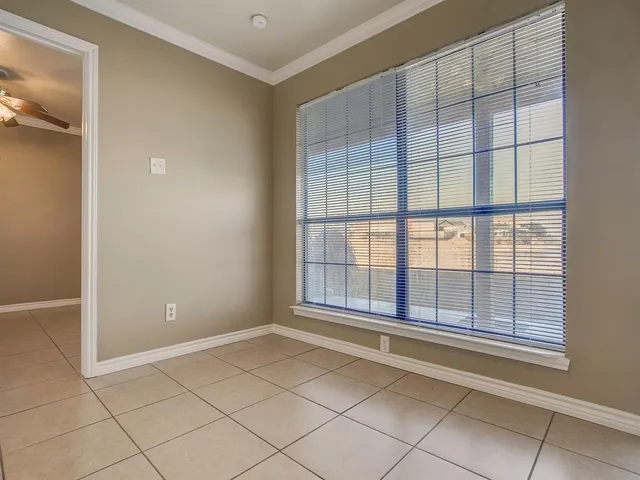 a kitchen with stainless steel appliances a stove top oven and cabinets