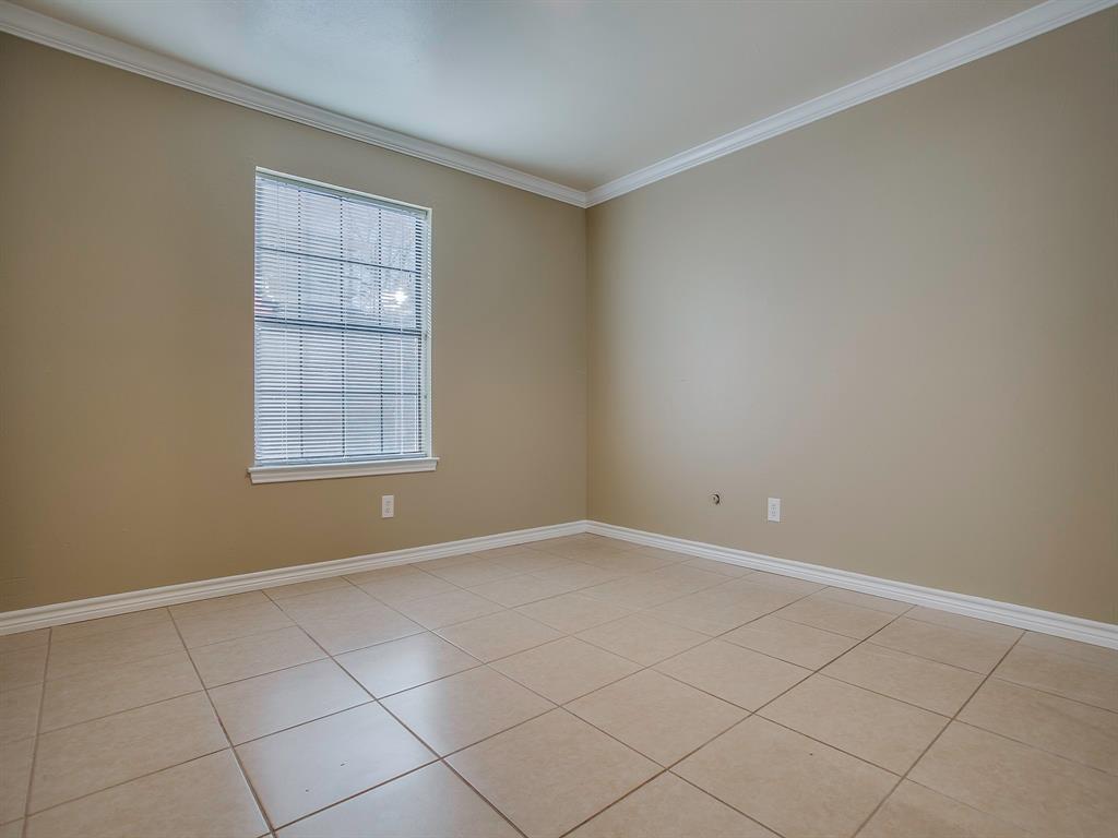 4492 Chaha Road, Unit 102 Garland, TX 75043 - Photo 39 of 40 an empty room with windows