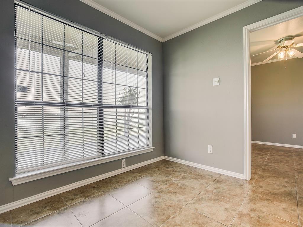 4492 Chaha Road, Unit 102 Garland, TX 75043 - Photo 7 of 40 a view of an empty room with a window