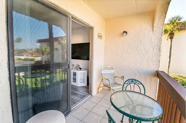 a bathroom with a granite countertop sink a mirror and a shower