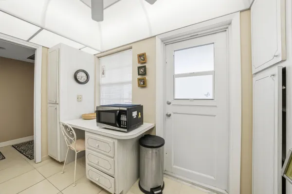 a kitchen with a stove and a refrigerator