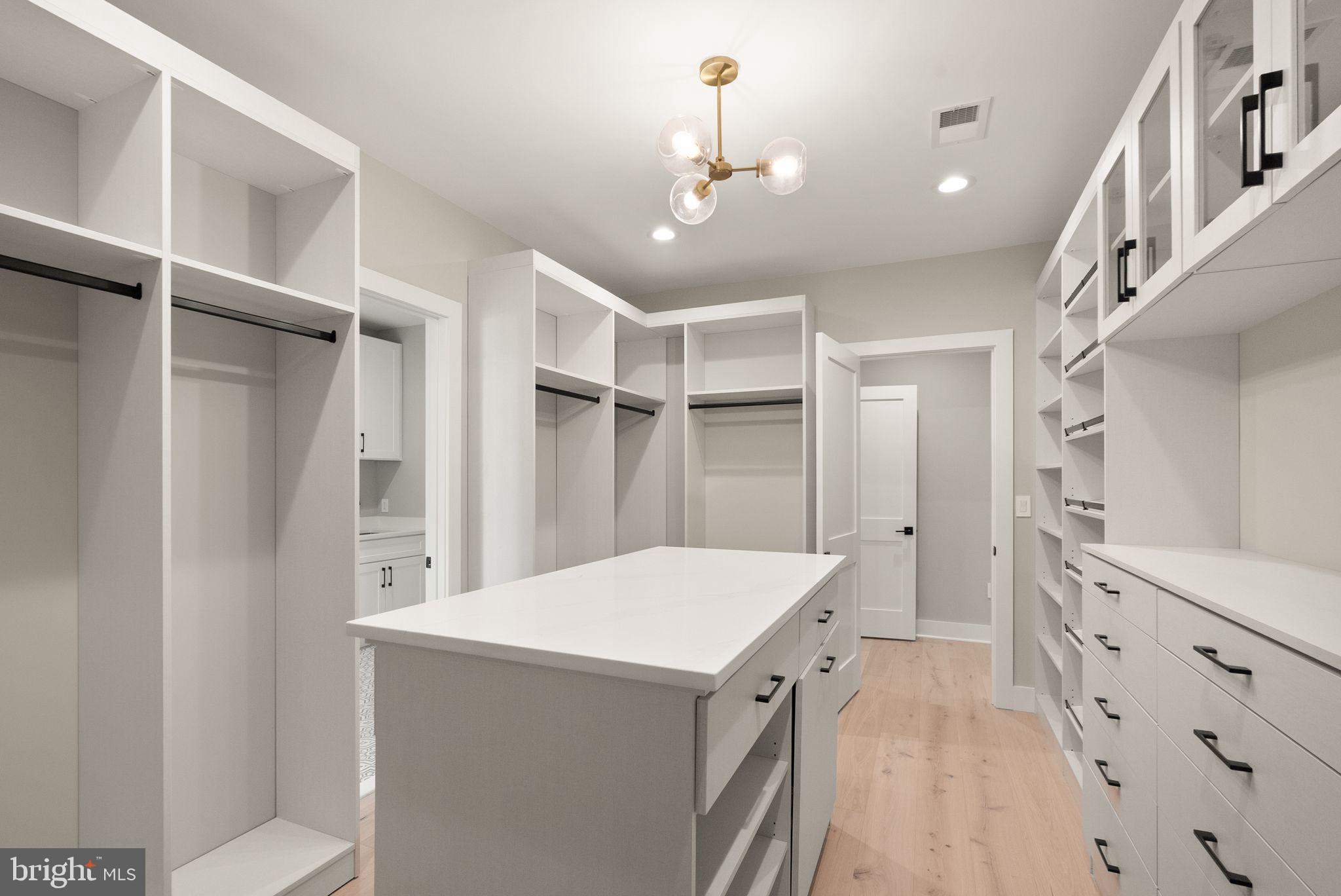 6329 Halsey Road McLean, VA 22101 - Photo 54 of 94 Spacious, modern walk-in closet design.
