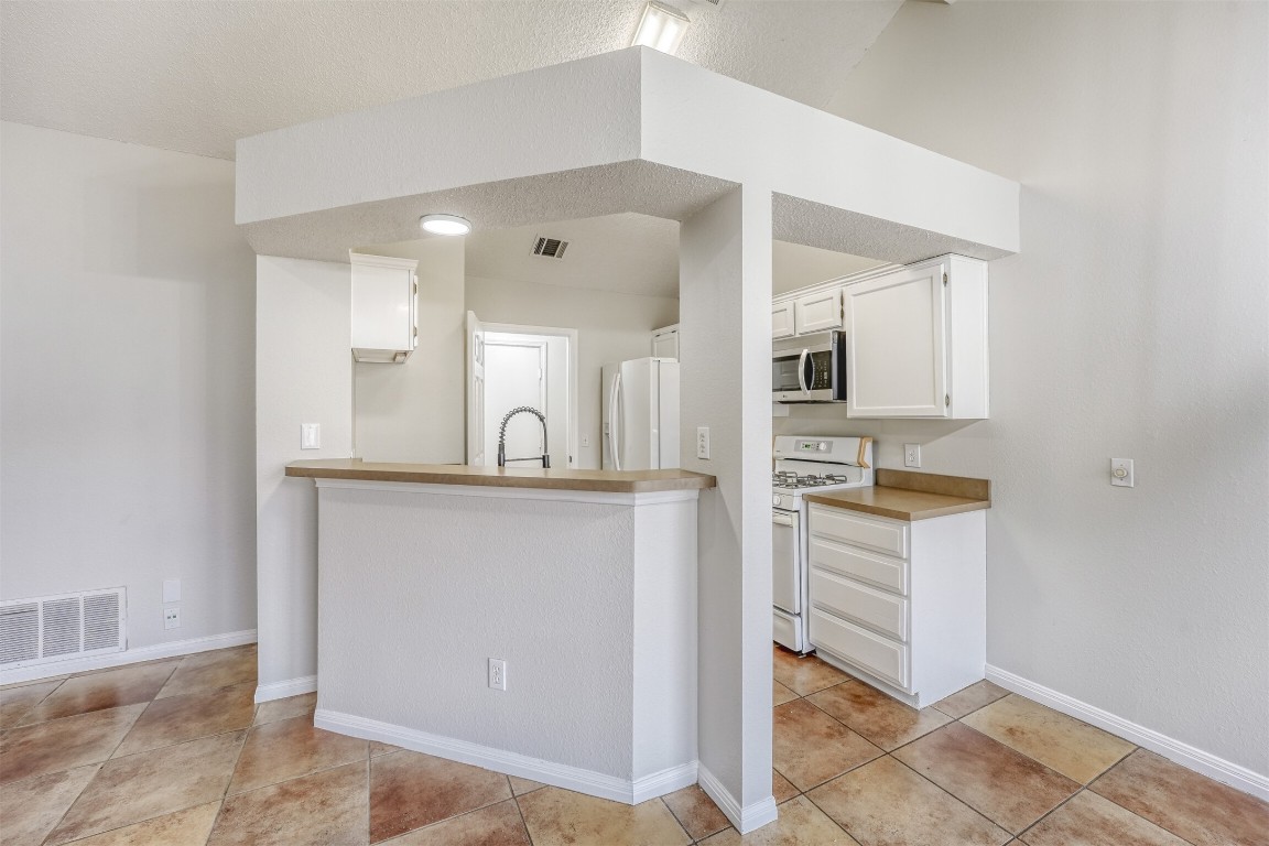 1002 Rambling Trail Cedar Park, TX 78613 - Photo 11 of 23 a bathroom with a sink and a mirror