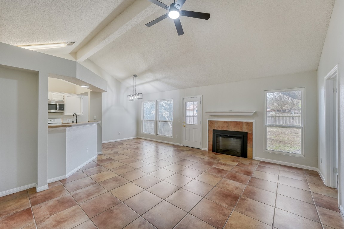 1002 Rambling Trail Cedar Park, TX 78613 - Photo 3 of 23 a view of a kitchen with furniture and a fireplace