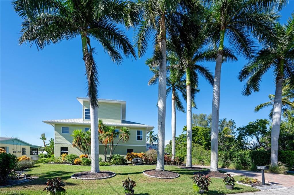 a front view of a building with garden