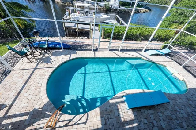 a bathroom with a sink toilet and a mirror