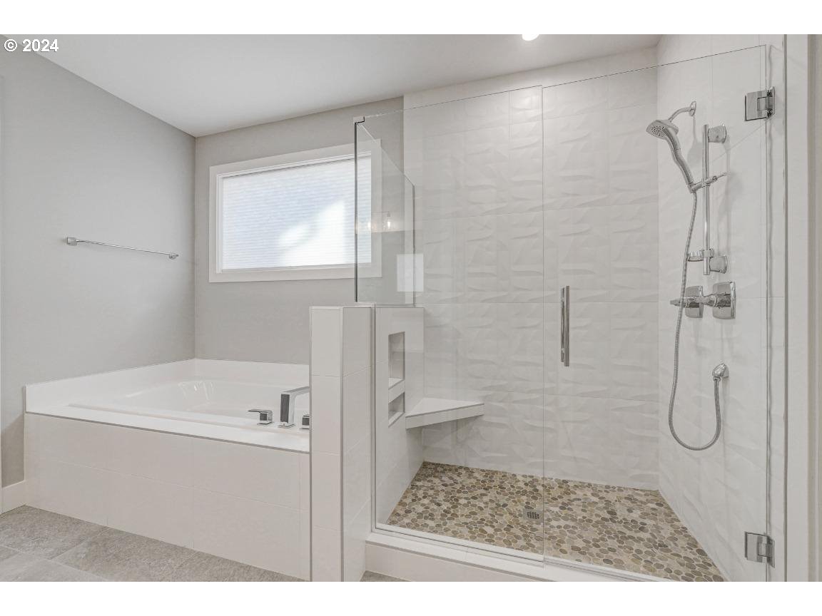 4120 South 17th Way Ridgefield, WA 98642 - Photo 13 of 20 a bathroom with a sink a toilet and shower