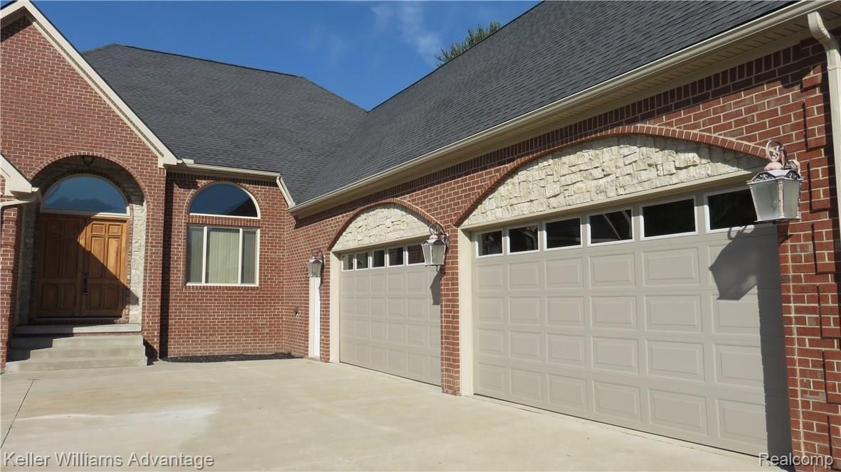 6487 North Beck Road Canton, MI 48187 - Photo 39 of 41 4 car garage 3 on front side