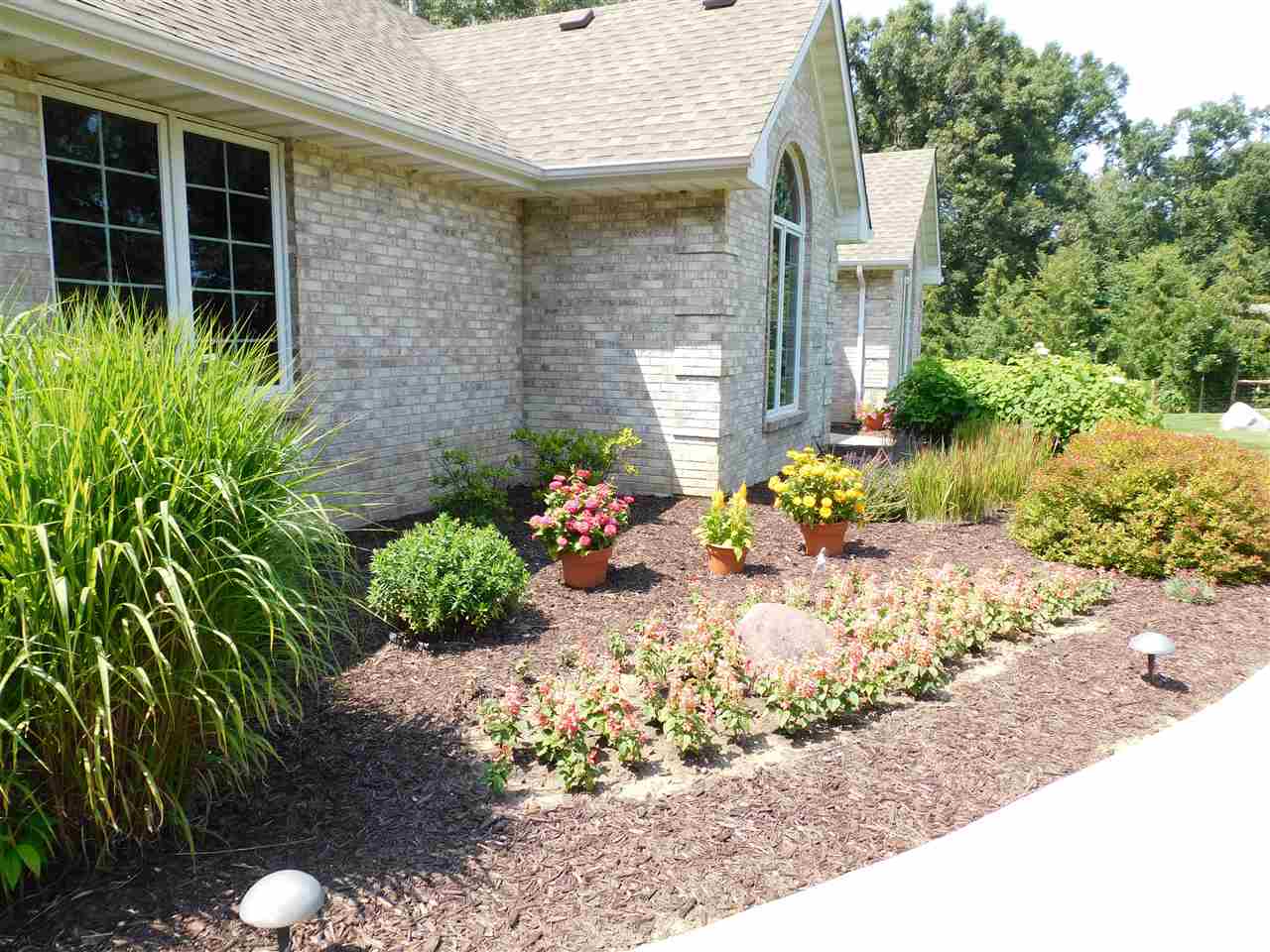 10062 Beaver Valley Road Belvidere, IL 61008 - Photo 22 of 25 a front view of a house with a yard