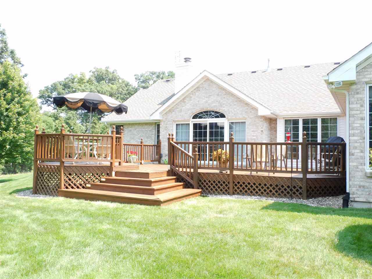 10062 Beaver Valley Road Belvidere, IL 61008 - Photo 23 of 25 a front view of a house with a yard