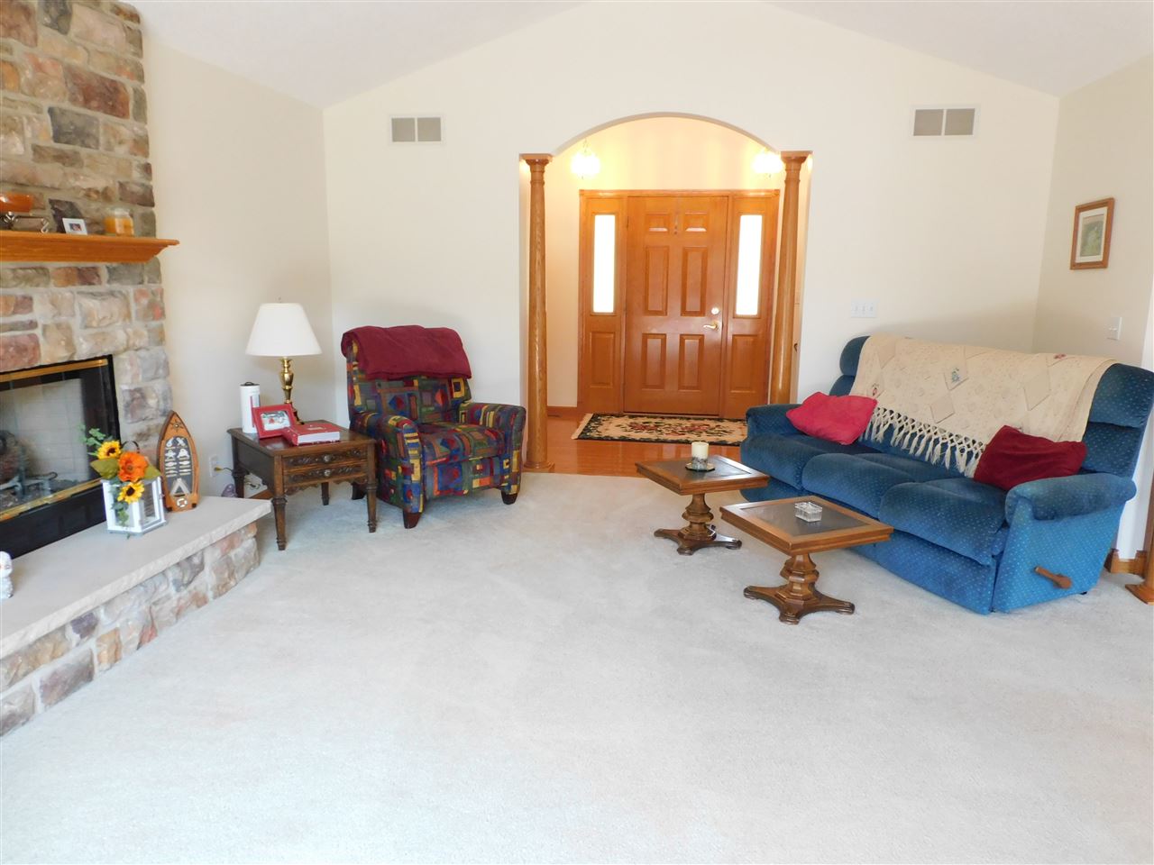 10062 Beaver Valley Road Belvidere, IL 61008 - Photo 4 of 25 a living room with furniture and a fireplace