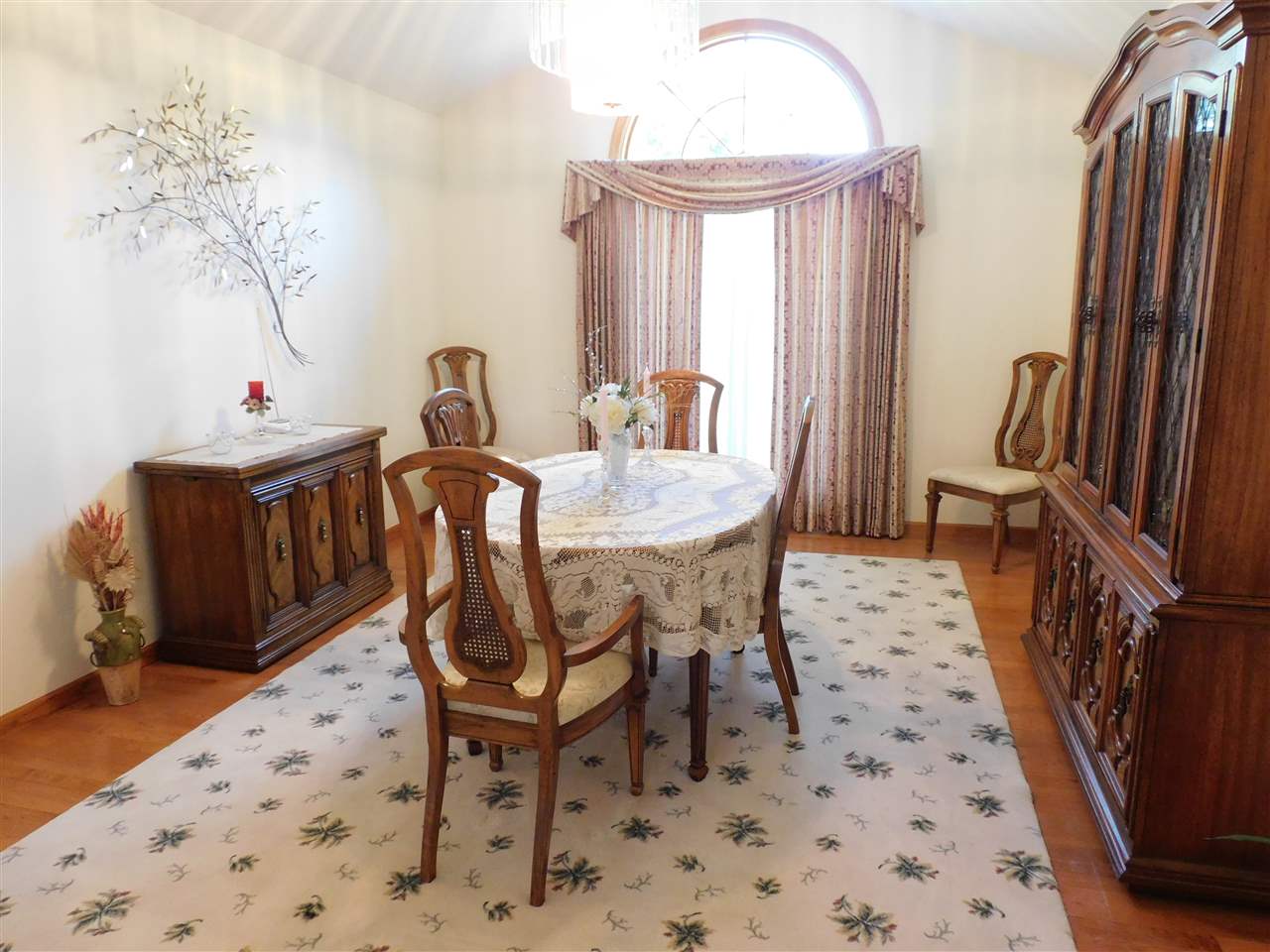 10062 Beaver Valley Road Belvidere, IL 61008 - Photo 7 of 25 a view of a dining room with furniture and a chandelier