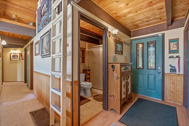 a outdoor living space with furniture and a fireplace