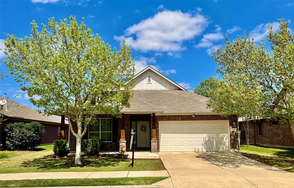 a view of a workspace with bookshelf
