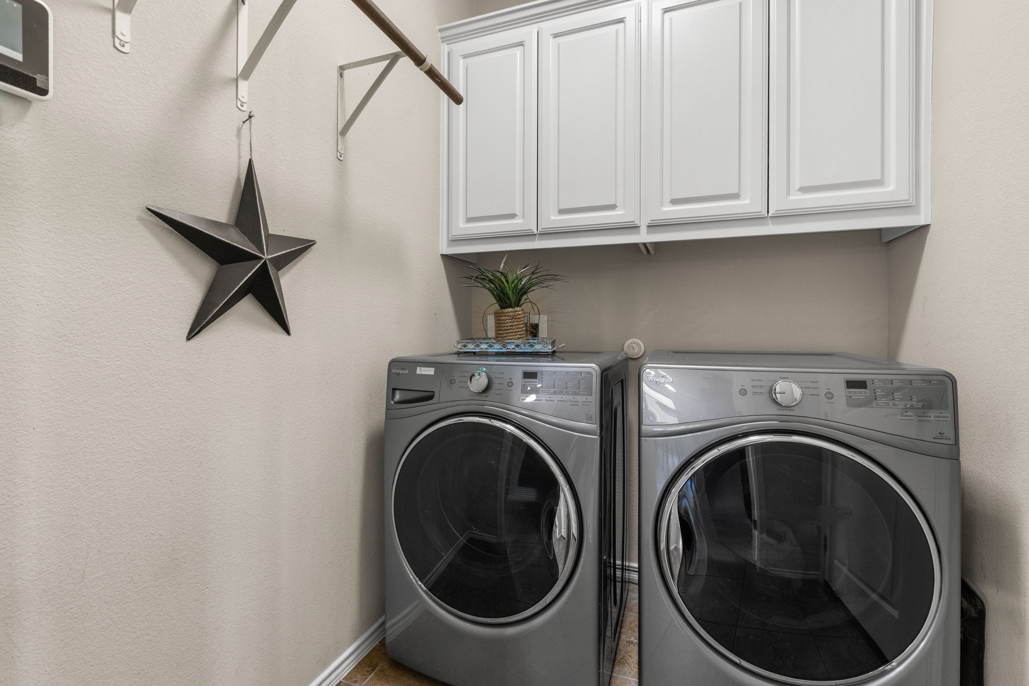 221 Blossom Valley Streme Buda, TX 78610 - Photo 29 of 40 a utility room with dryer and washer