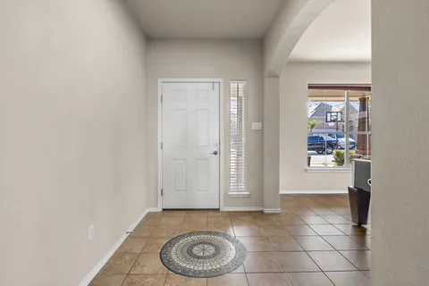a view of a workspace with bookshelf