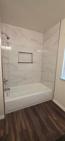 a bathroom with a bathtub