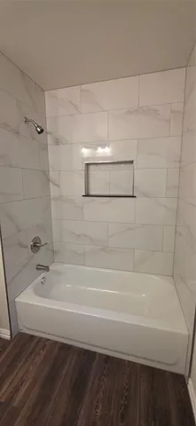 a bathroom with a bathtub