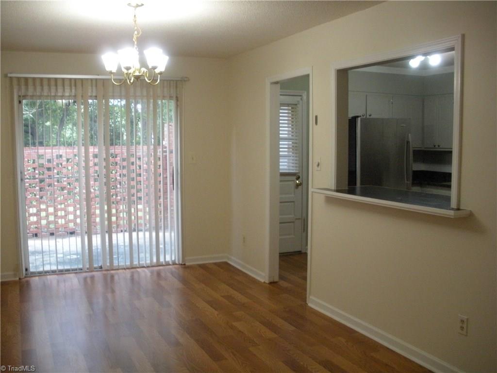 211 Northpoint Avenue, Unit G High Point, NC 27262 - Photo 5 of 21 Dinning Room with lots of light and opened up to the kitchen.