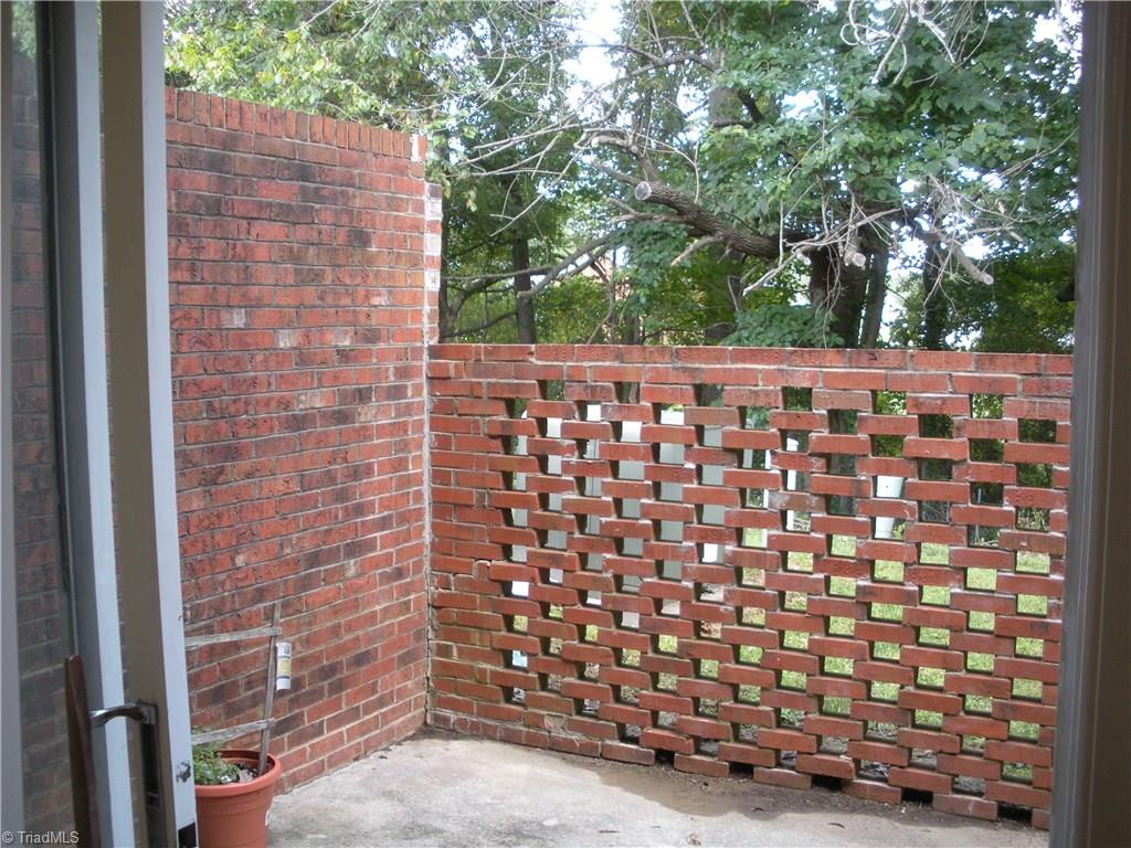 211 Northpoint Avenue, Unit G High Point, NC 27262 - Photo 10 of 21 Back patio off the dinning and kitchen area 15' x 9'