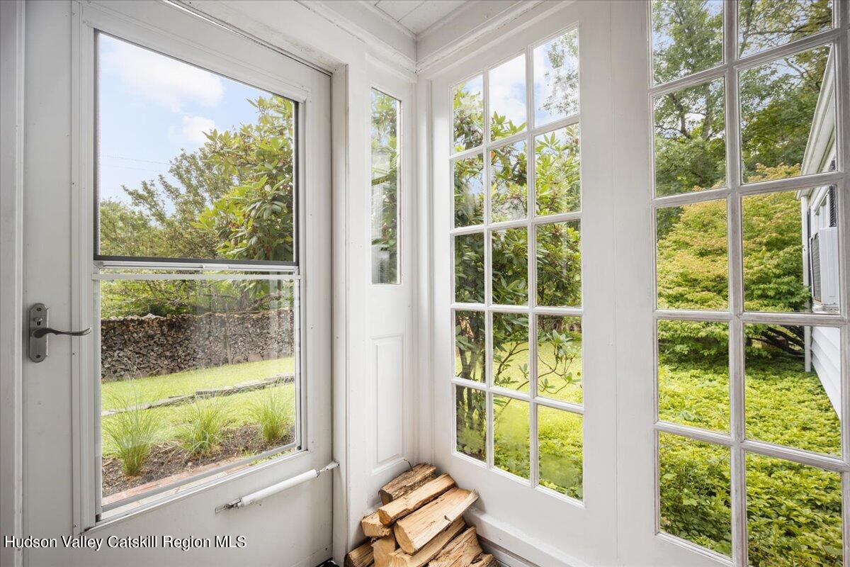 32 West Hurley Road, Unit ROUTE 375 Woodstock, NY 12498 - Photo 11 of 36 a view of a room that has a bed and a window