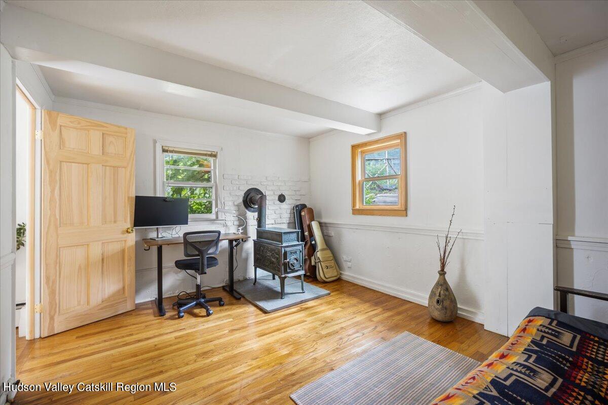 32 West Hurley Road, Unit ROUTE 375 Woodstock, NY 12498 - Photo 19 of 36 a view of a workspace with furniture and a window