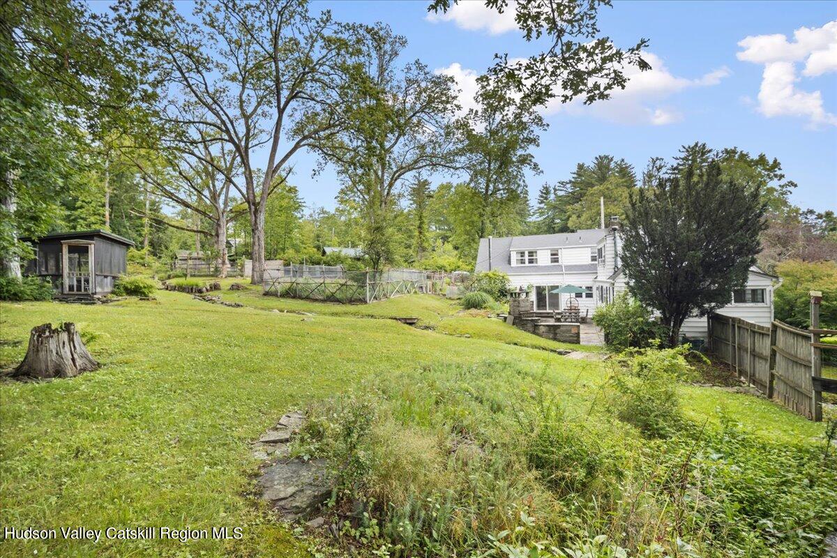 32 West Hurley Road, Unit ROUTE 375 Woodstock, NY 12498 - Photo 30 of 36 a view of a house with a yard