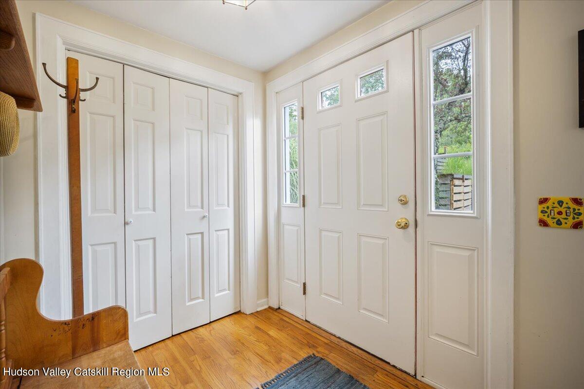 32 West Hurley Road, Unit ROUTE 375 Woodstock, NY 12498 - Photo 3 of 36 a view of a livingroom with furniture and a window