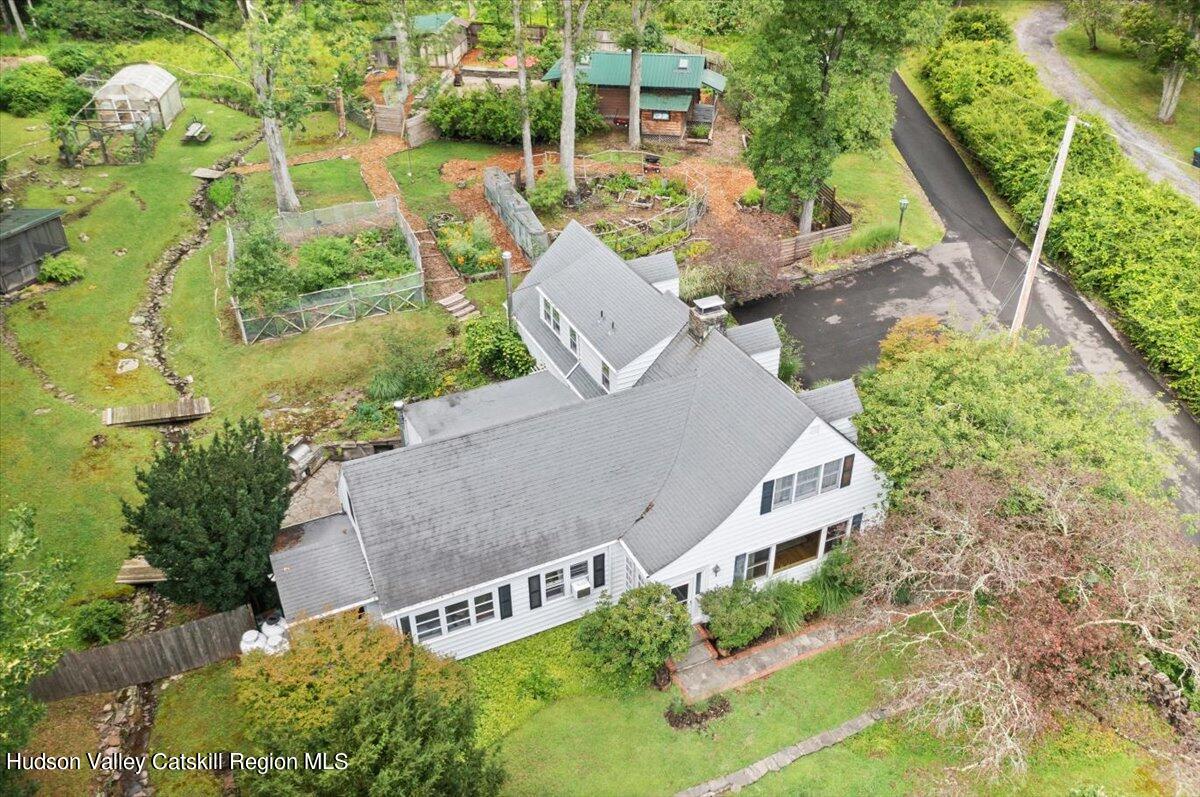 32 West Hurley Road, Unit ROUTE 375 Woodstock, NY 12498 - Photo 32 of 36 an aerial view of a house with swimming pool and garden