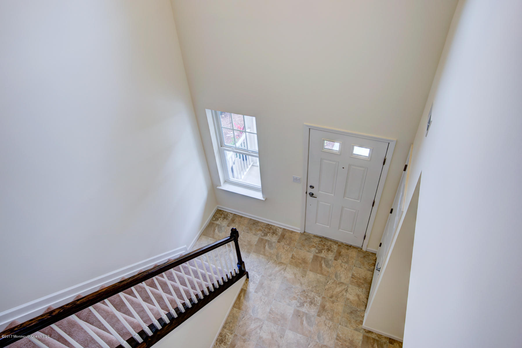 53 Rockingham Way Manchester Township, NJ 08759 - Photo 10 of 17 wooden floor in an empty room with windows