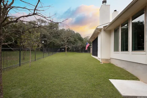 a backyard of a house with lots of green space