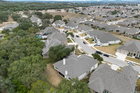 an aerial view of a house with a garden