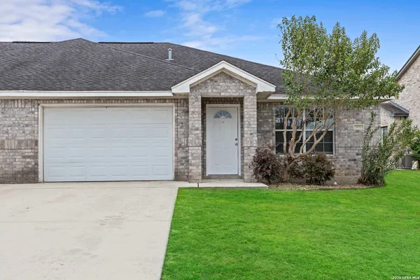 front view of house with a yard