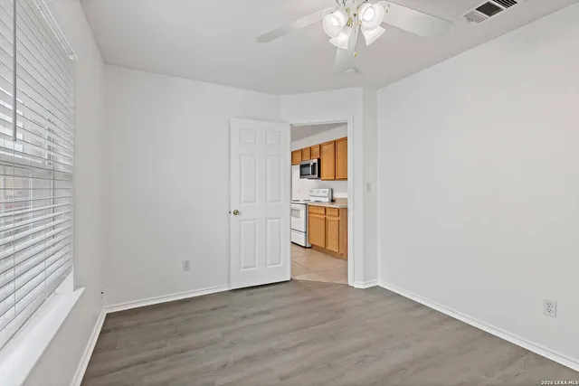 a view of a kitchen with a sink and dishwasher