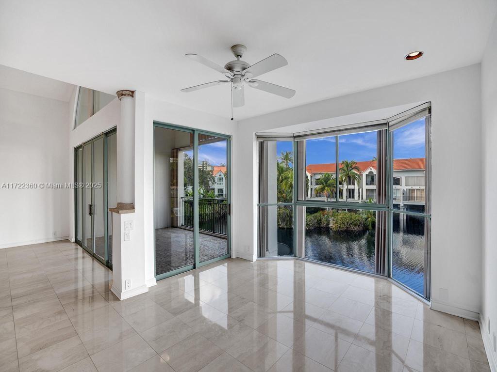 8850 Southwest 67th Court Pinecrest, FL 33156 - Photo 13 of 49 a view of a livingroom with a ceiling fan and a ceiling fan