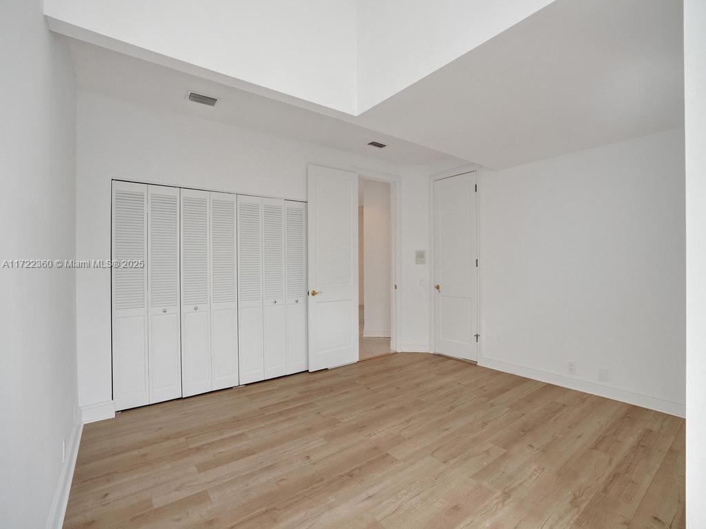 8850 Southwest 67th Court Pinecrest, FL 33156 - Photo 22 of 49 a view of an empty room