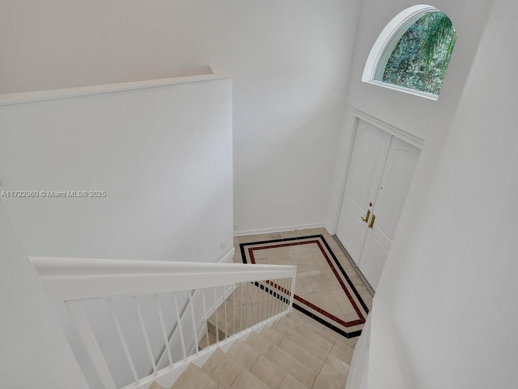 8850 Southwest 67th Court Pinecrest, FL 33156 - Photo 24 of 49 a view of a room with rack on the wall