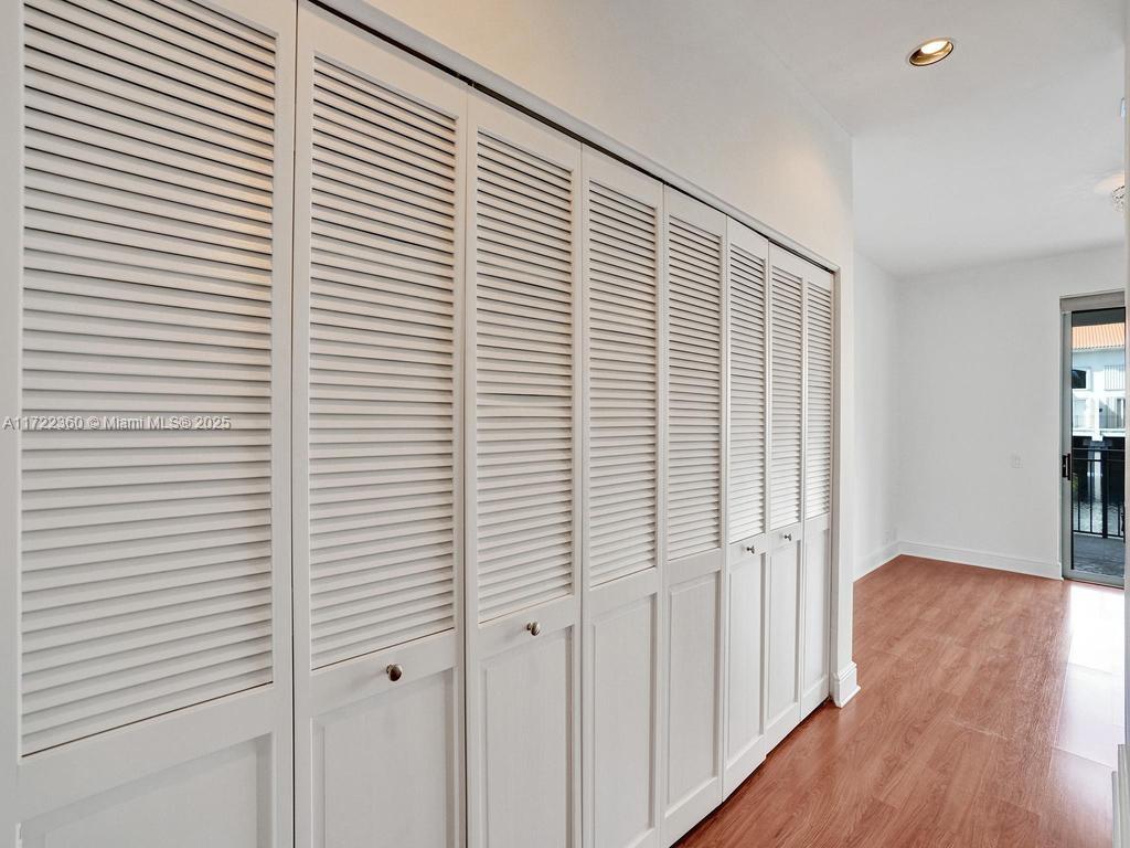 8850 Southwest 67th Court Pinecrest, FL 33156 - Photo 36 of 49 a view of a room with wooden floor