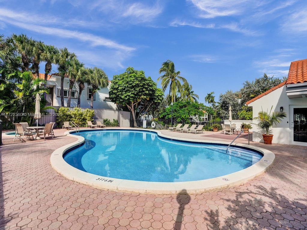 8850 Southwest 67th Court Pinecrest, FL 33156 - Photo 41 of 49 a view of outdoor space yard swimming pool and outdoor seating
